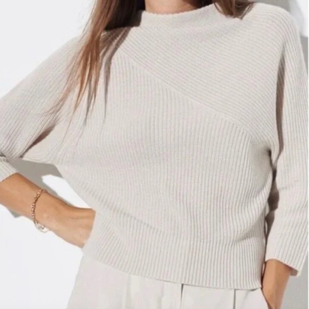 The Reset Cream Turtleneck Sweater